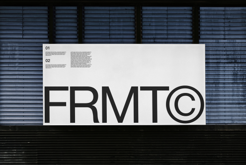 Billboard graphic design mockup on a building facade with bold typography and branding elements, ideal for realistic presentation.