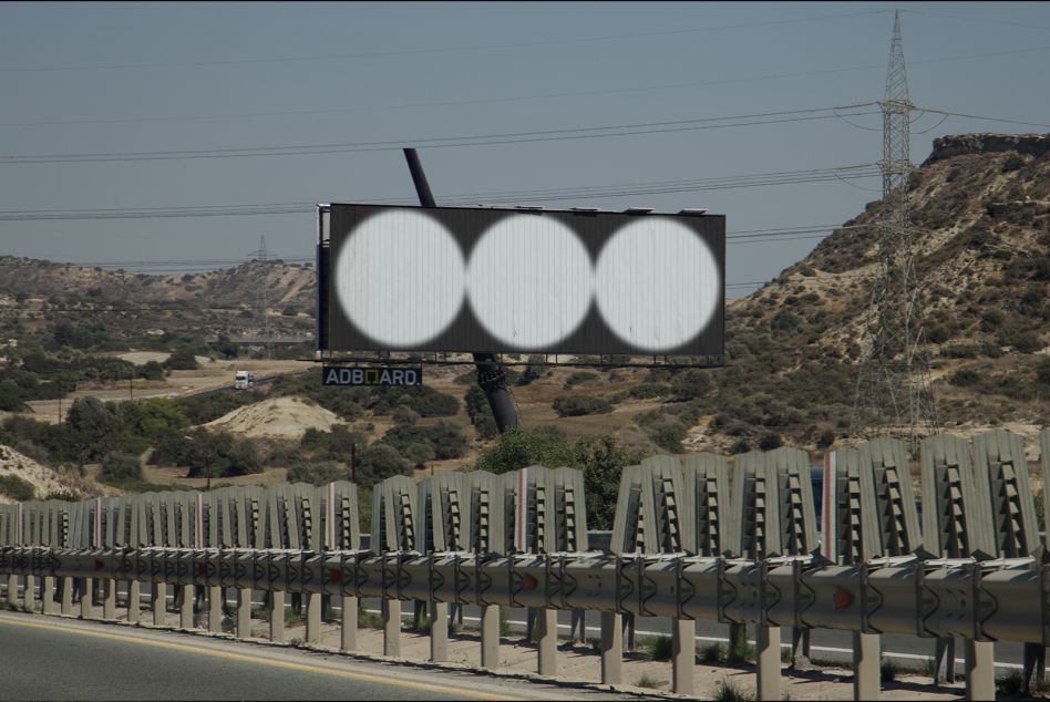 Billboard mockup on roadside with scenic hill background, ideal for outdoor advertising designs and promotional graphics display.