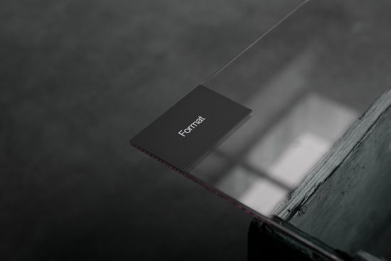 Elegant business card mockup on glass surface with reflection ideal for presenting corporate branding designs to designers.