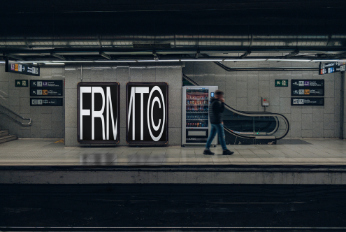 Subway station poster mockup with bold typography design in display, blurred pedestrian, urban environment, great for advertising mockups.