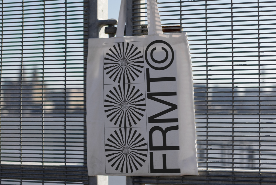 Outdoor banner mockup hanging on metal fence with graphic design elements and clear typography, perfect for branding presentations.