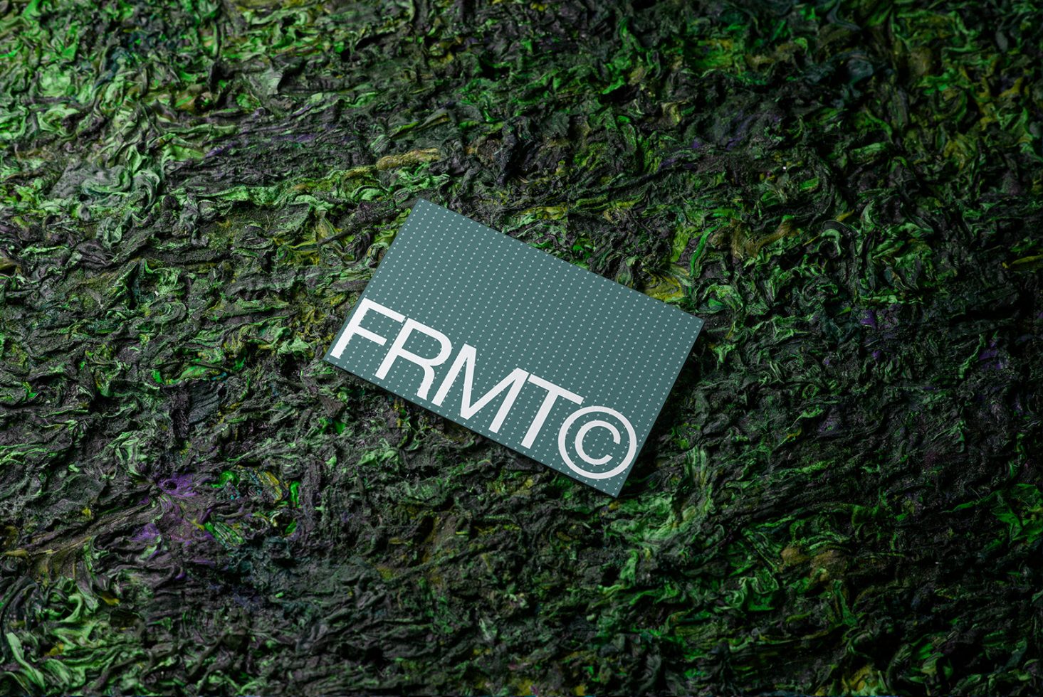 Business card mockup on textured multicolored background, presenting logo and design display for portfolio, vivid visual for graphic designers.