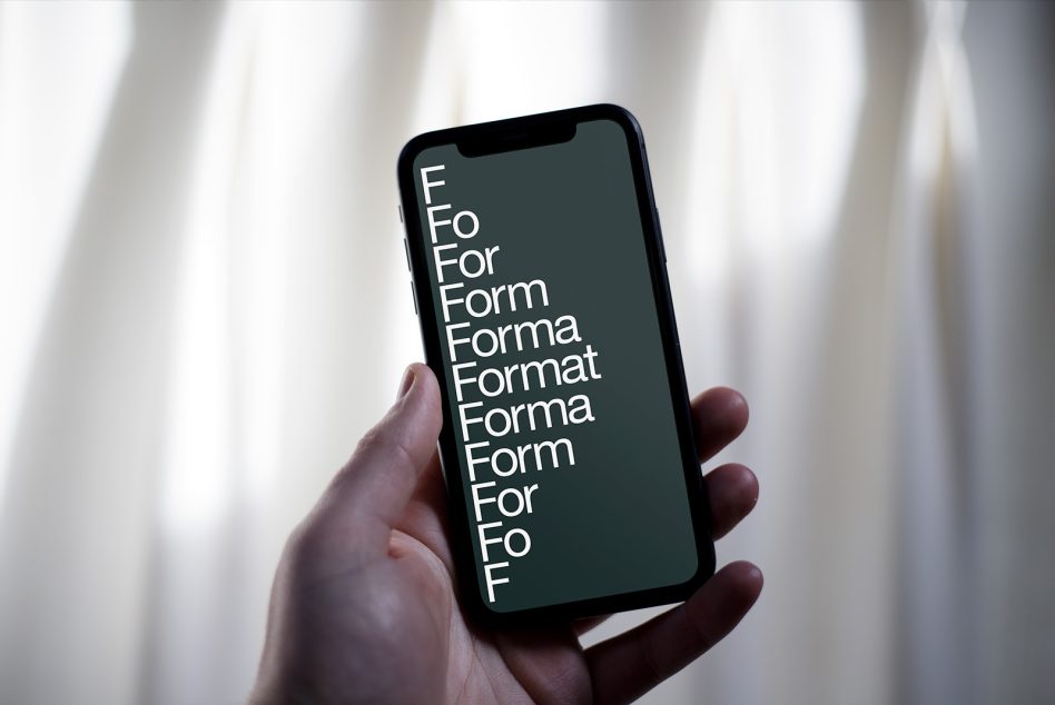 Hand holding smartphone displaying font steps mockup with sheer curtains background, ideal for showcasing typeface design in templates category.