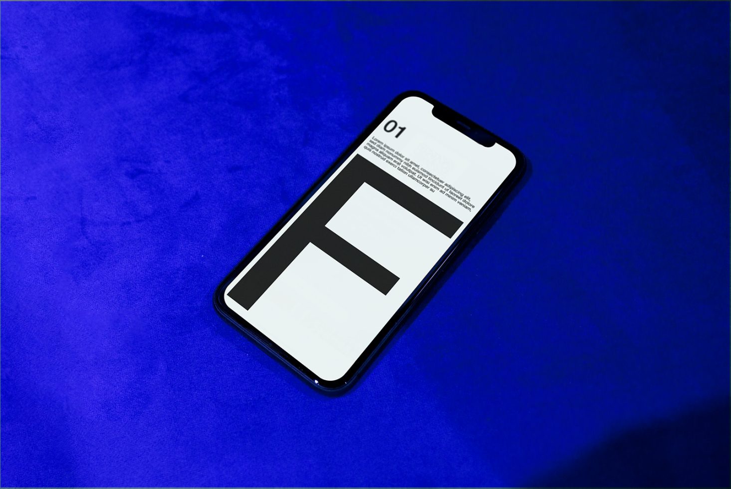 Smartphone mockup on blue surface showcasing screen design, ideal for app presentation, digital mockups, design showcase.