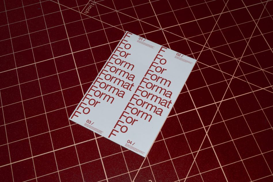 Folded brochure mockup with burgundy geometric grid background showing four white pages with red typography
