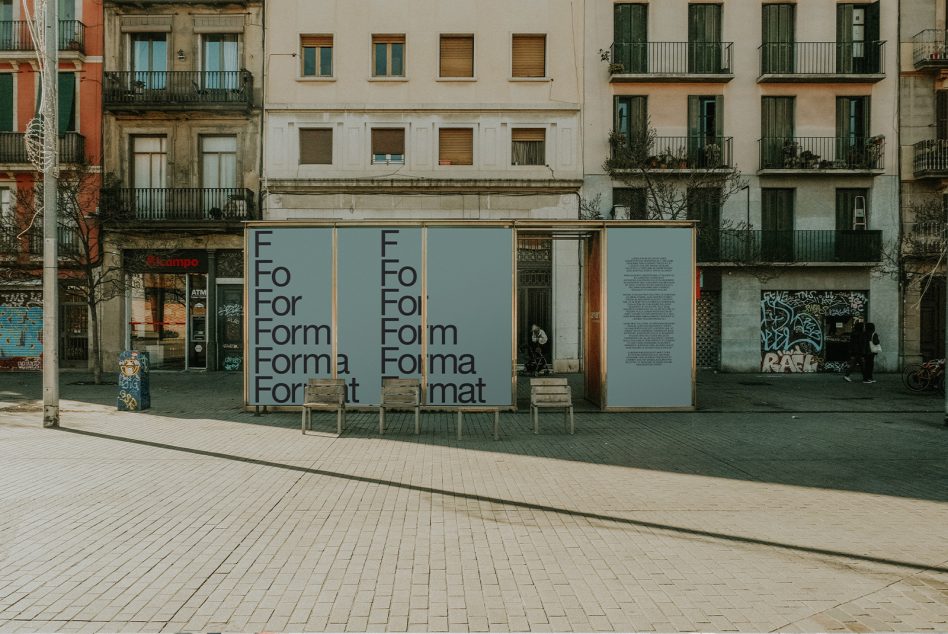 Urban outdoor exhibition mockup with typography design posters, cityscape background, ideal for showcasing fonts and graphics.