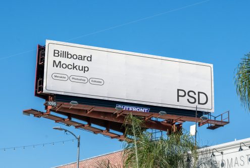 Outdoor billboard mockup with clear sky, showcasing PSD format for Photoshop, ideal for advertising design previews and presentations.