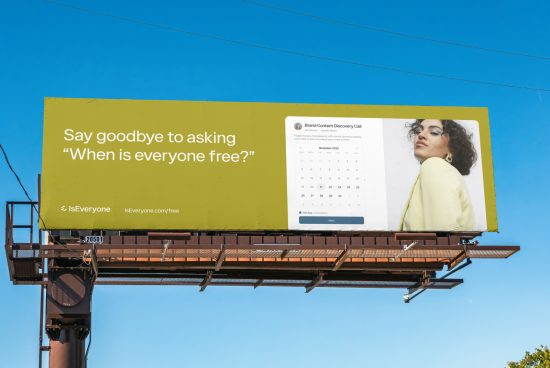 Billboard design mockup featuring a scheduling app advertisement with clear sky background, ideal for presenting outdoor ad campaigns.