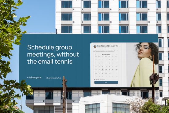 Billboard mockup on building featuring ad for scheduling tool with calendar interface, model in professional attire, clear sky, urban setting.
