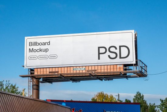 Outdoor billboard mockup displaying large PSD text set against a clear blue sky, promoting easy-to-edit advertising design templates.