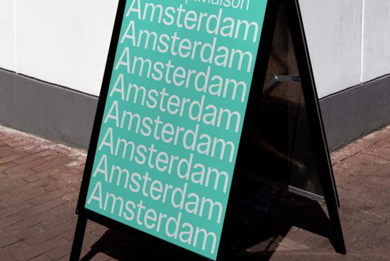A-frame sign mockup displaying repeated 'Amsterdam' text in modern font, on sidewalk, for signage design showcase.
