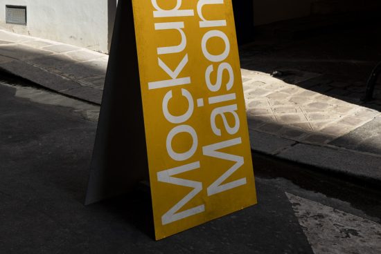 Urban sandwich board mockup with bold typography in sunlight, showcasing display design for street advertising, ideal for mockup category.