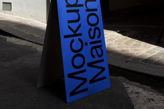 Urban sandwich board mockup with blue and black design, street view, editable template for designers, realistic shadow and texture.