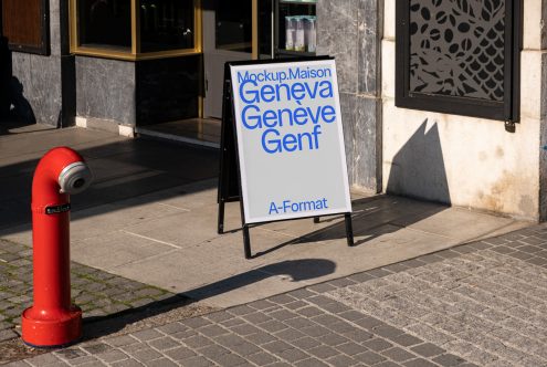 Sidewalk A-frame sign mockup in urban setting perfect for graphic designers seeking realistic display for branding projects.