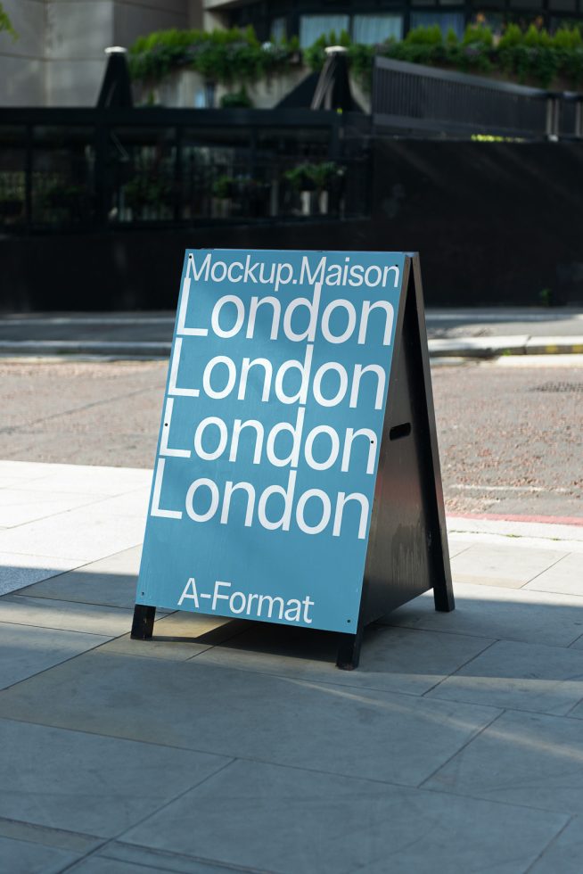 Outdoor advertisement mockup of an A-frame sign with text and design on a sidewalk for designers and marketers.