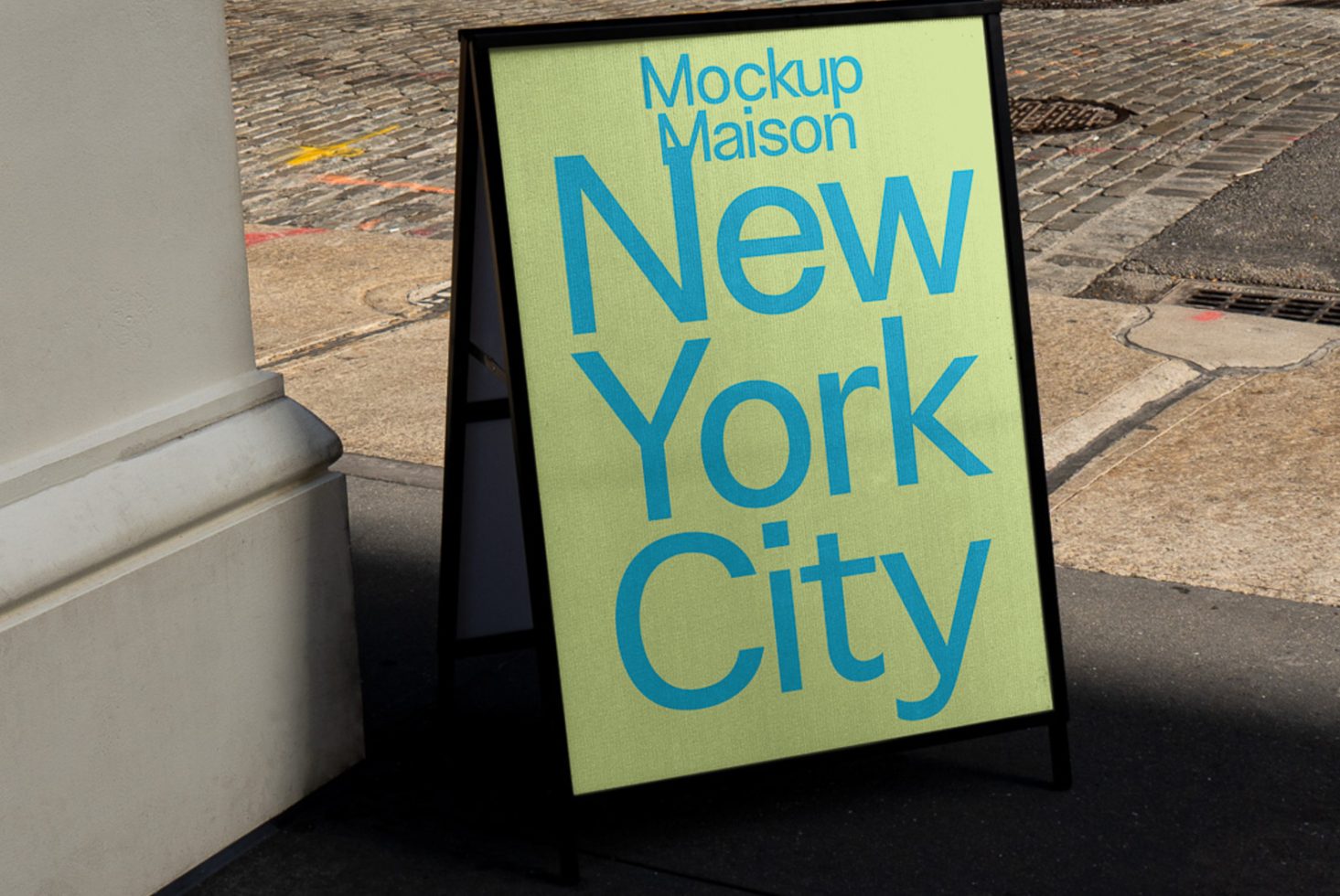 Realistic street sidewalk signboard mockup with bold New York City typography design, ideal for showcasing outdoor advertising graphics and fonts.