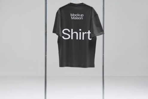 Black t-shirt mockup on hanger for fashion design, realistic clothing template, versatile graphic asset for designers.