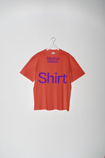Red tee on hanger with bright blue typography design