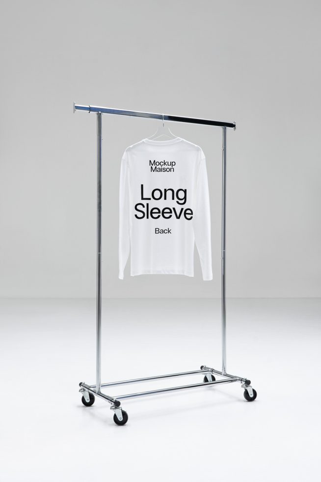 White long sleeve t-shirt mockup on a metal hanger rack with wheels, isolated on a clean background, perfect for design presentations.