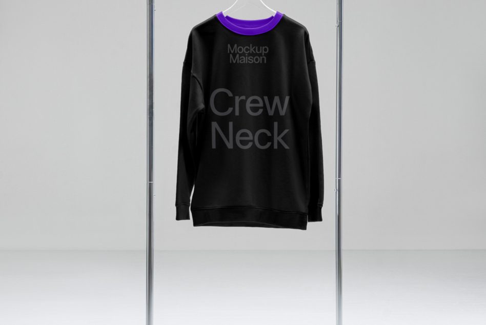 Black crew neck sweatshirt mockup hanging on clear rack with purple collar detail for fashion design presentations.