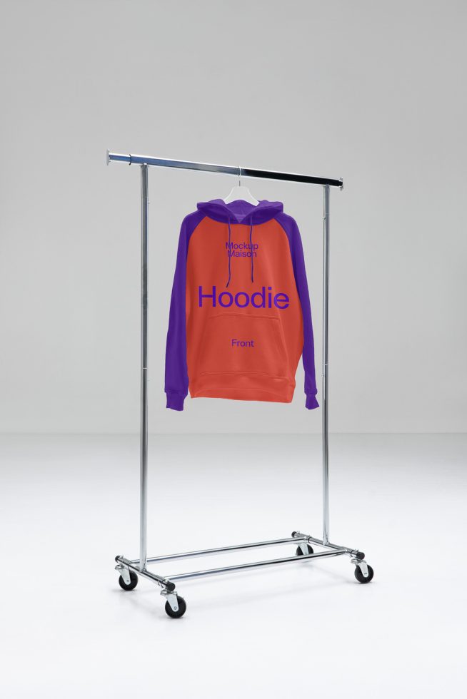 Orange and purple hoodie on a metal stand with wheels against a plain background, ideal for apparel design mockup.