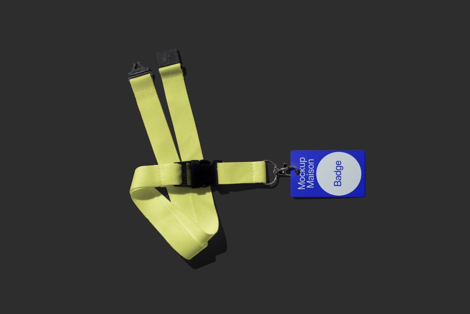 Neon yellow breakaway lanyard with blue badge mockup on dark background