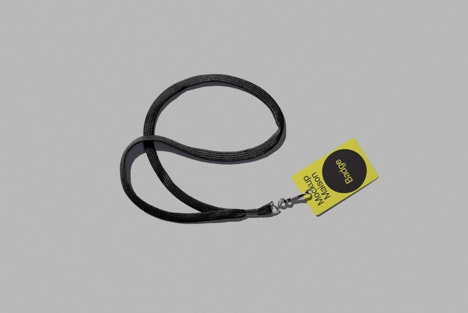 Black braided rope lanyard with yellow badge mockup on gray background