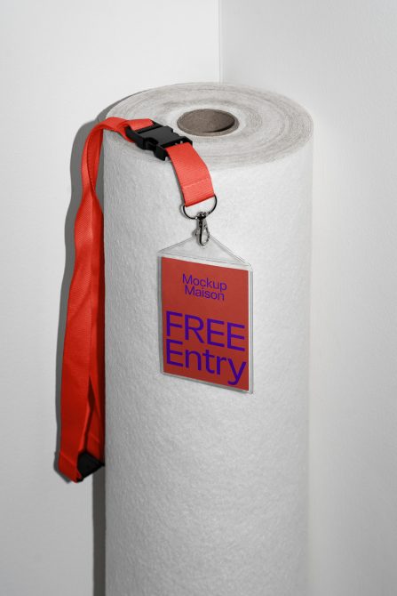 Realistic lanyard mockup on textured roll with Free Entry pass design, showcasing event badge template for designers.