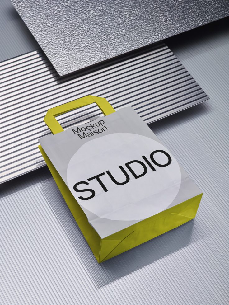 Elegant paper bag mockup on patterned backgrounds for branding presentation, with the text Mockup Maison and STUDIO, perfect for designers.