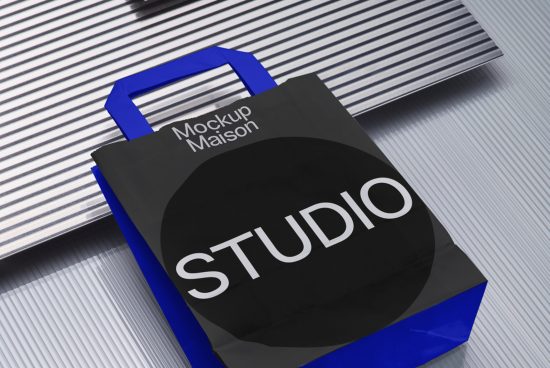 Black and blue shopping bag mockup with striped shadow, design presentation, clean visual, branding asset for designers.