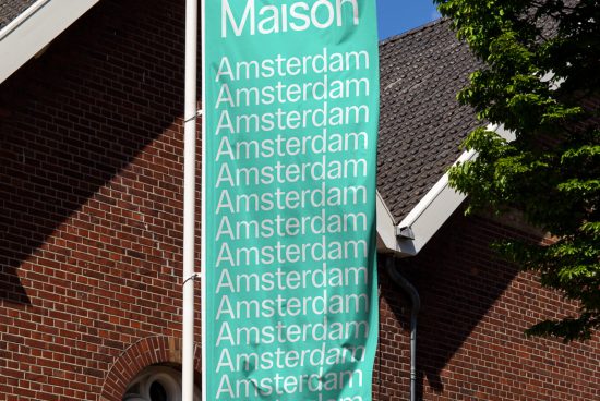 Turquoise banner with repeated 'Amsterdam' text overlay against brick building, showcasing modern font design for graphic templates.