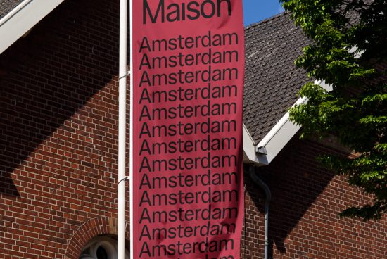 Banner mockup with repetitive typography design, displaying 'Amsterdam' on a building facade, ideal for font previews and graphic design.