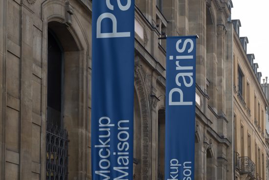 Vertical banner mockups hanging on classic European building exterior, great for showcasing design in real-world settings for designers.
