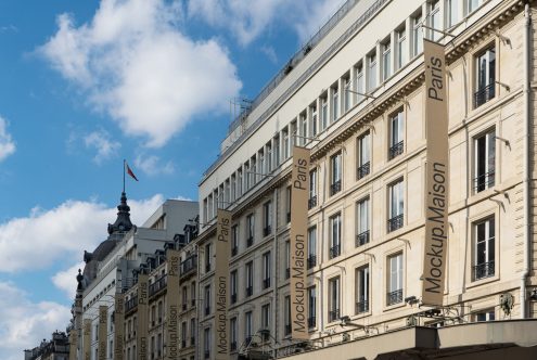 Parisian building facade mockup with clear blue sky, ideal for designers interested in graphics, architecture templates, urban mockups.