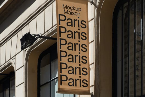 Mockup of a vertical banner with repetitive 'Paris' text, on a building facade, useful for showcasing font and design presentation.