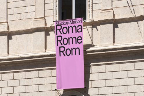 Banner mockup on building facade with text Roma Rome Rom, for urban advertising design display in Mockups category.