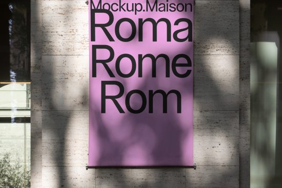 Vertical banner mockup hanging on a concrete wall with natural shadows, displaying text design 'Roma' in bold font, suitable for branding presentations.