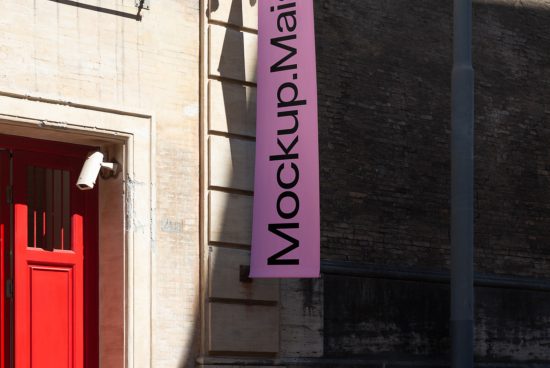 Purple banner with 'Mockup.Mail' text on building exterior, urban setting for mockup template, useful for designers in branding presentations.