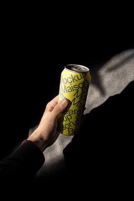 Hand holding beverage can mockup with dynamic shadow, design presentation, realistic packaging mockup, product mockup for graphic designers.