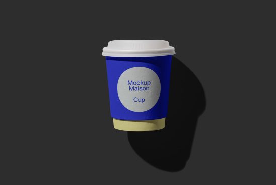 Coffee cup mockup with replaceable design on dark background, ideal for branding presentations and packaging designs.