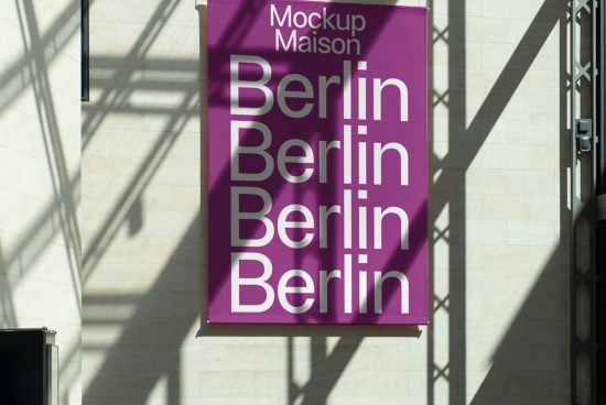 Banner mockup on building displaying text 'Berlin' with shadows, ideal for designers to showcase outdoor advertising graphics.