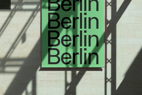 Graphic poster mockup with bold 'Berlin' text in green on a wall casting shadow, ideal for showcasing typeface or design concepts.