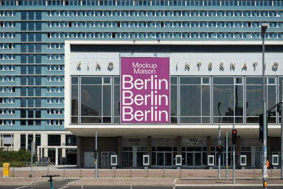 Urban poster mockup on building facade with bold Berlin typography design, showcasing display architecture, ideal for advertising graphics.