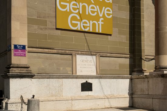 Geneva sign on building facade with shadows and architecture details, perfect for mockups, urban graphics, and template designs.