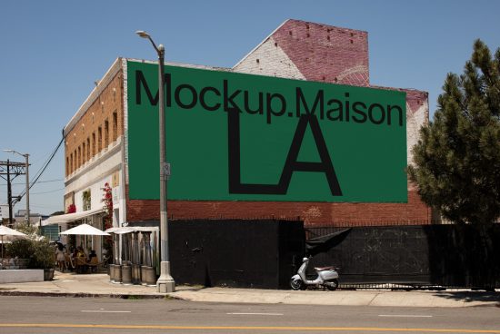 Urban billboard mockup on a building with a clear sky, suitable for designers to showcase their work in a realistic setting.