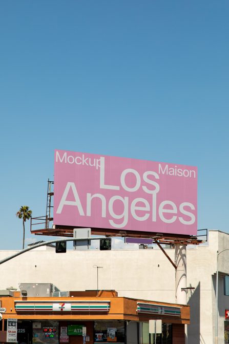 Billboard mockup with editable Los Angeles text on a sunny day, for graphic design presentation, clear sky background, urban setting.