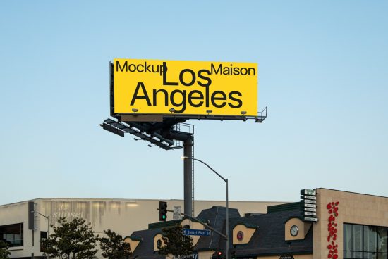 Billboard mockup template on a clear day with editable text for designers to showcase advertising designs in a real-life urban setting.