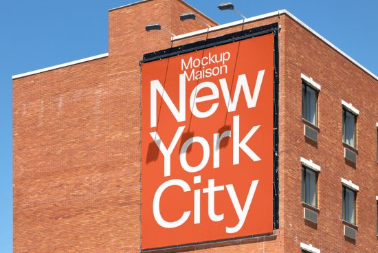 Urban billboard mockup on brick building with bold New York City typography design, perfect for presentations and advertising.