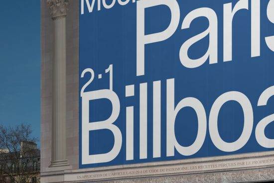 Large outdoor billboard mockup with bold typography design, featuring text "Paris 21" against a blue background, perfect for presentation and advertising.