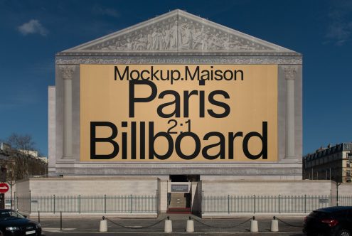 Urban billboard mockup displayed on a classic building facade, clear sky, editable design for advertising presentation, graphic designers asset.